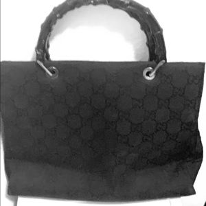 Black Gucci bag w/Bamboo handles.